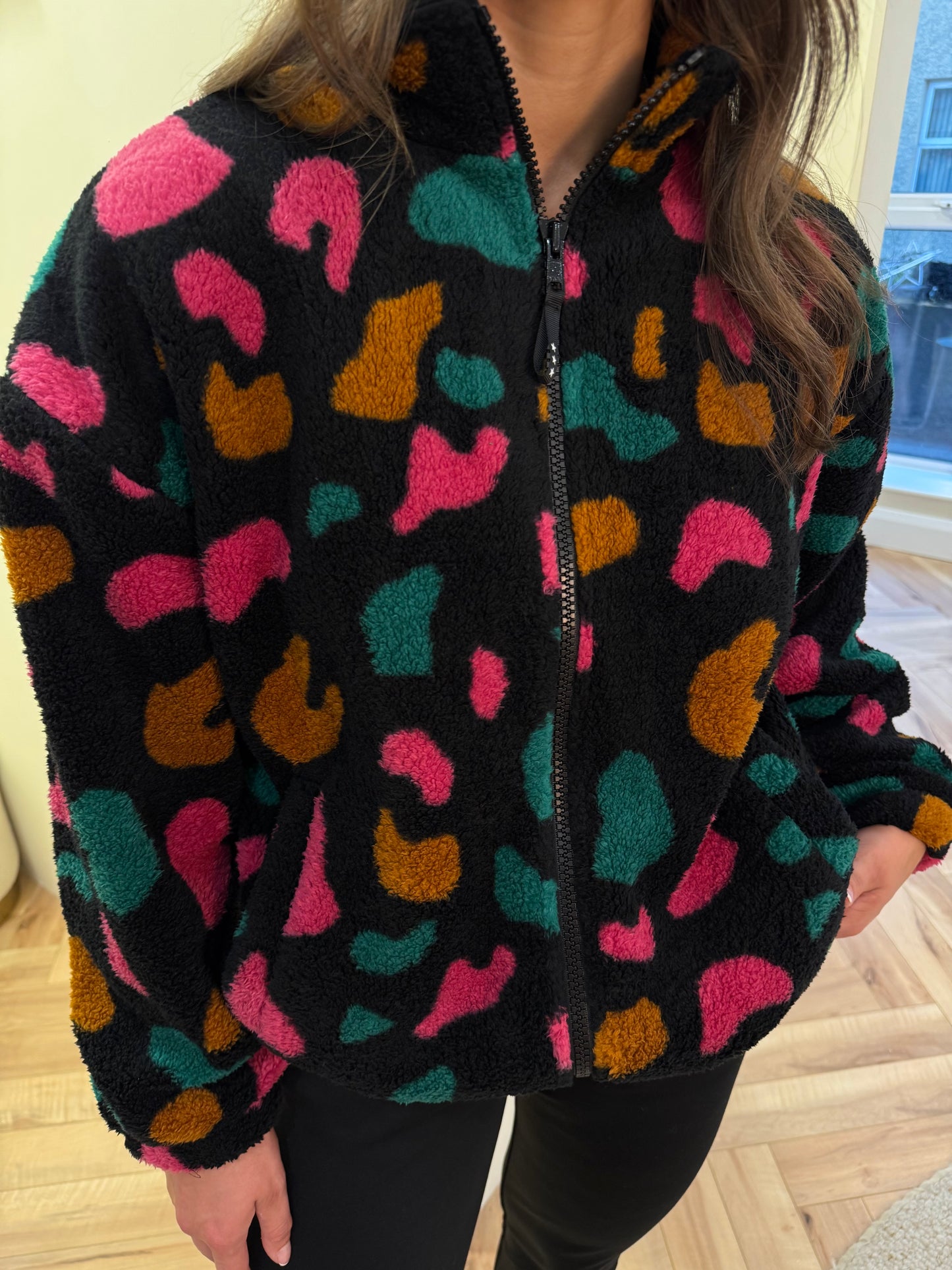 Hartley Zip Up Fleece in Black & Colourful Shapes