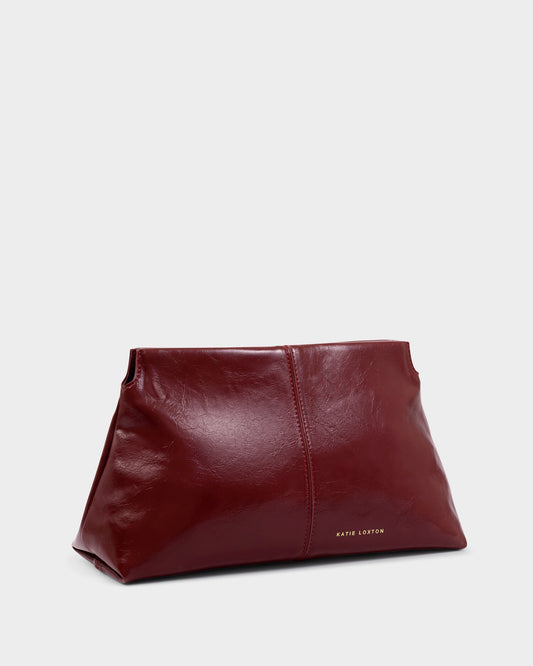 Laila Textured Patent Clutch bag in Cherry