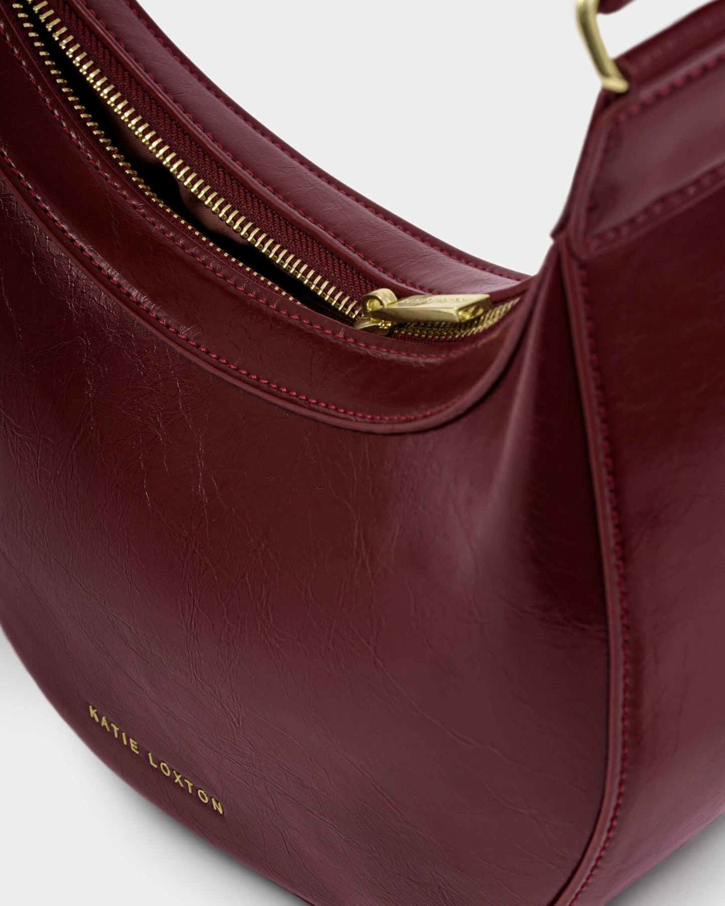 Amina Patent Crackle Sling Bag in Cherry