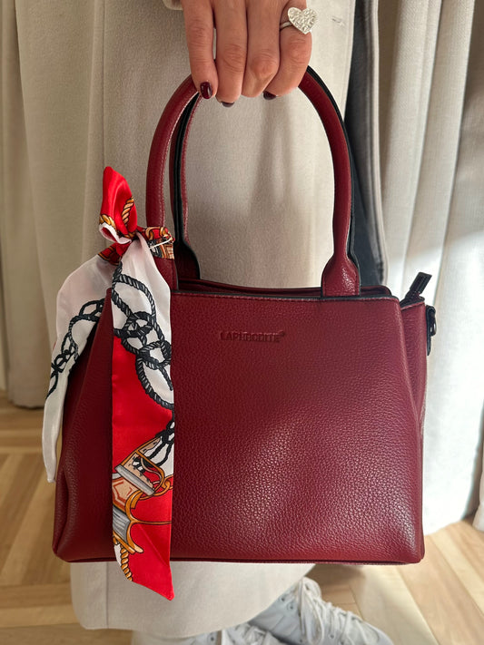 Red handbag with scarf tie