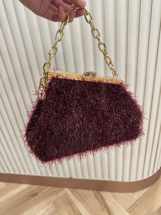 Burgundy sparkly clutch bag