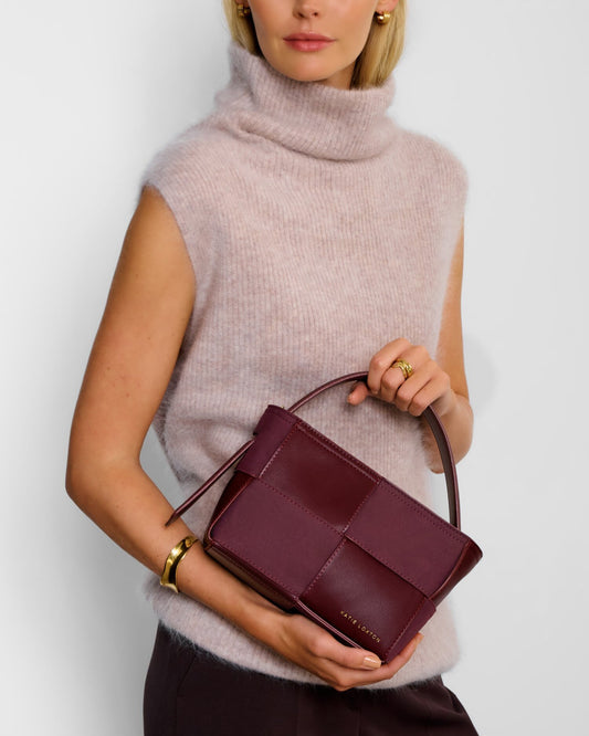 Taya Hand Woven Suedette Top Handle Bag in Cherry