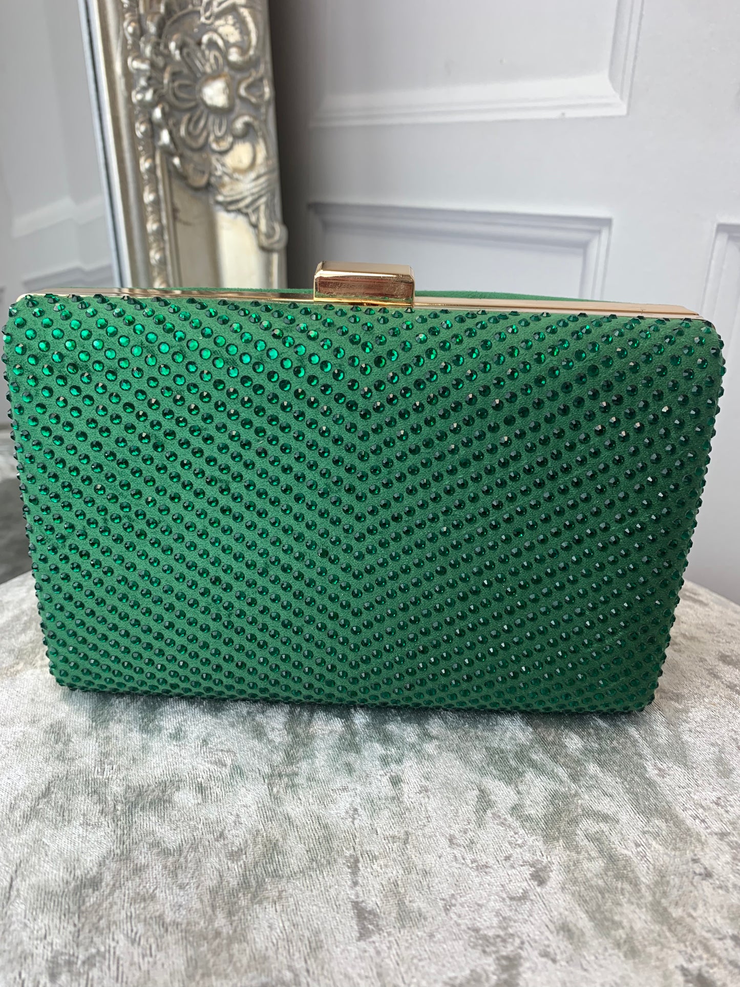 Green diamanté clutch bag