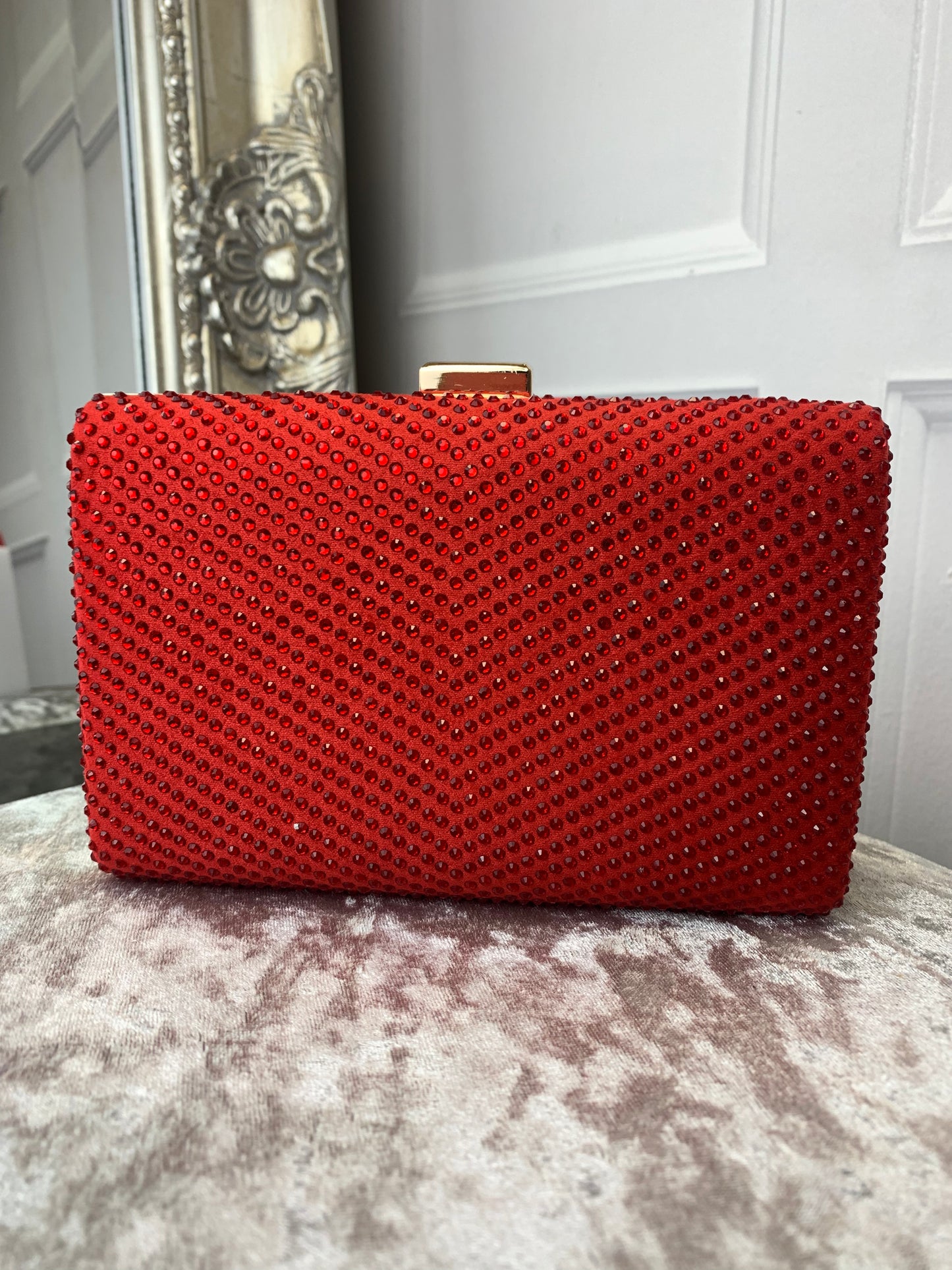 Red diamanté clutch bag